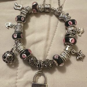 Handmade- NWOT –925 silver plated charm bracelet. Black/pnk beads variety charms